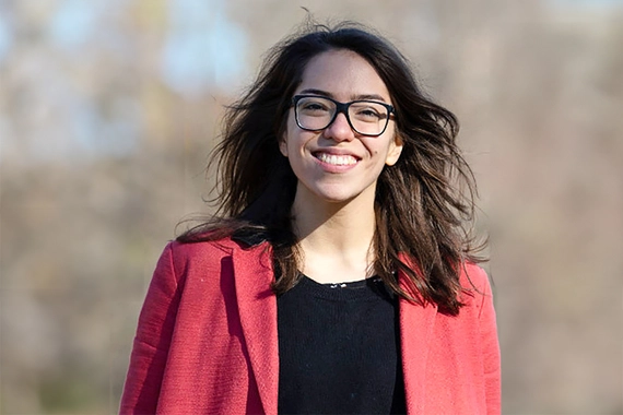 A portrait of Raundi, a Principal Scientist Oncology at Novartis